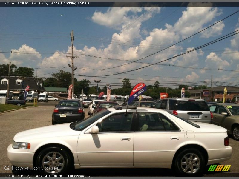 White Lightning / Shale 2004 Cadillac Seville SLS