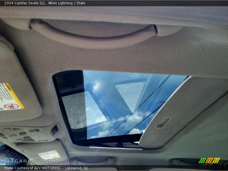 White Lightning / Shale 2004 Cadillac Seville SLS