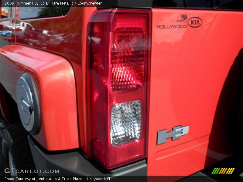 Solar Flare Metallic / Ebony/Pewter 2009 Hummer H3