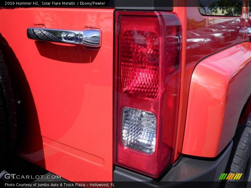 Solar Flare Metallic / Ebony/Pewter 2009 Hummer H3