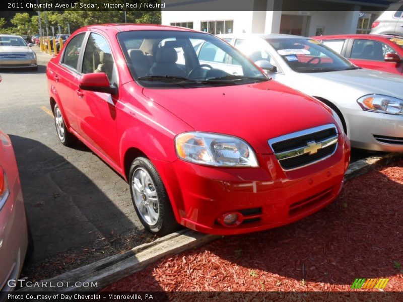 Victory Red / Neutral 2011 Chevrolet Aveo LT Sedan