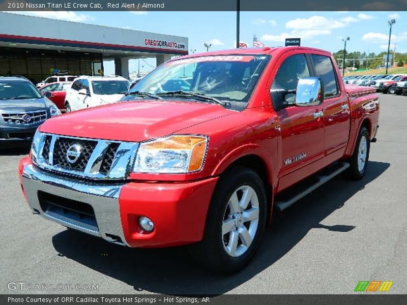 Red Alert / Almond 2010 Nissan Titan LE Crew Cab