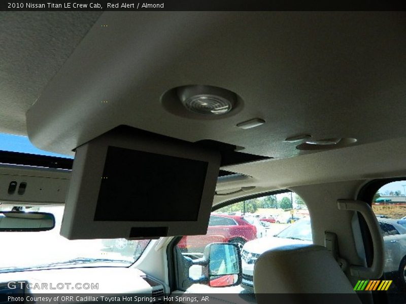 Red Alert / Almond 2010 Nissan Titan LE Crew Cab