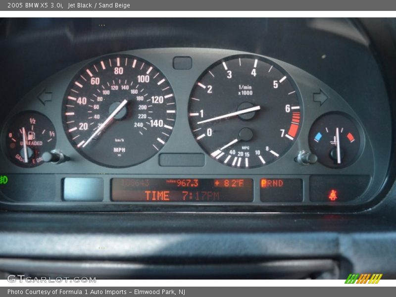 Jet Black / Sand Beige 2005 BMW X5 3.0i