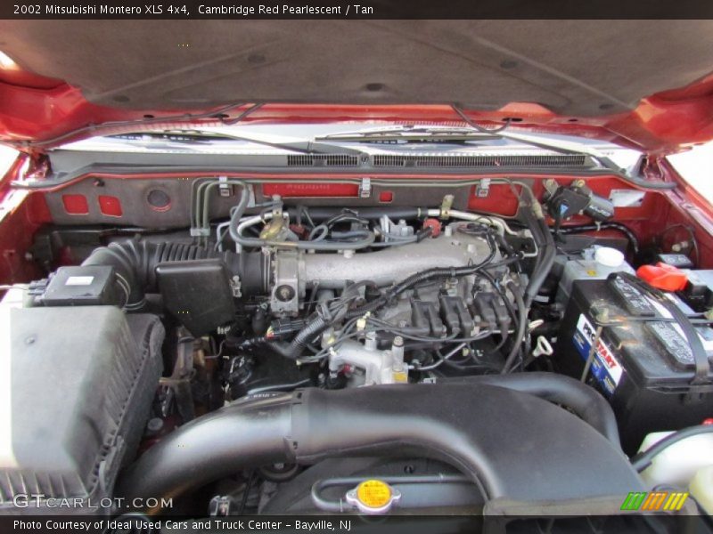 Cambridge Red Pearlescent / Tan 2002 Mitsubishi Montero XLS 4x4