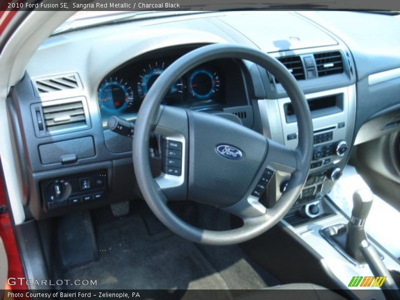 Sangria Red Metallic / Charcoal Black 2010 Ford Fusion SE