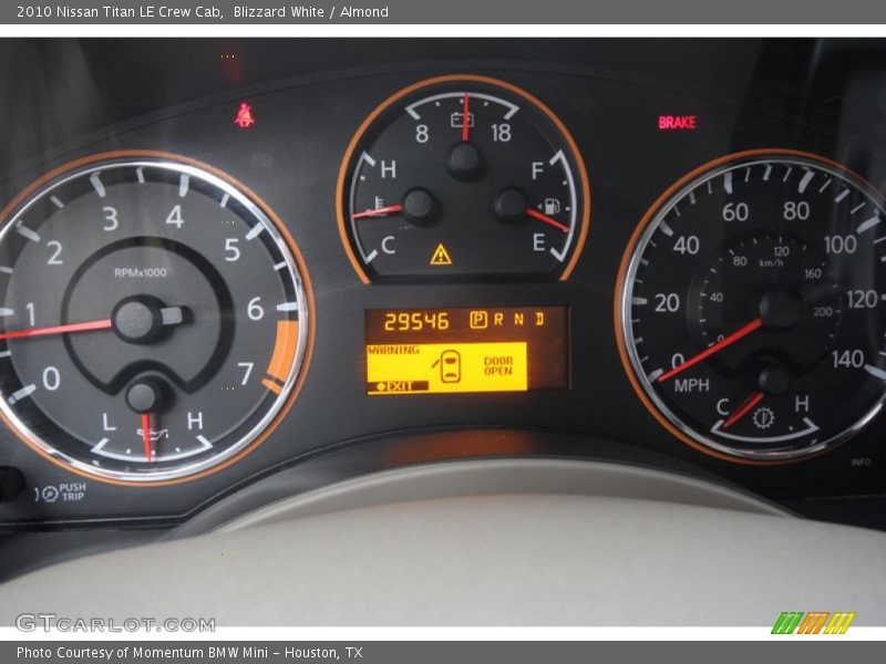 Blizzard White / Almond 2010 Nissan Titan LE Crew Cab