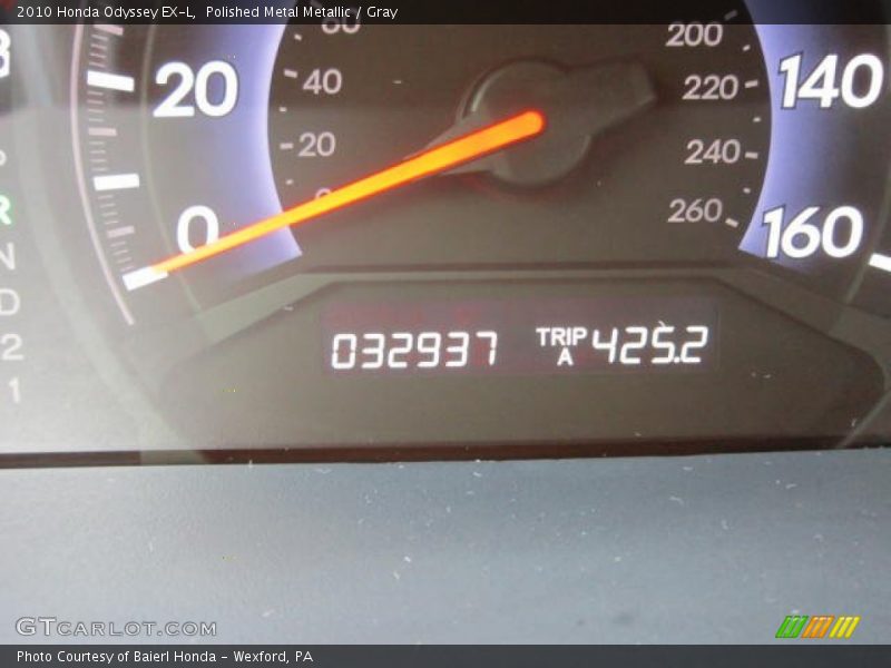 Polished Metal Metallic / Gray 2010 Honda Odyssey EX-L