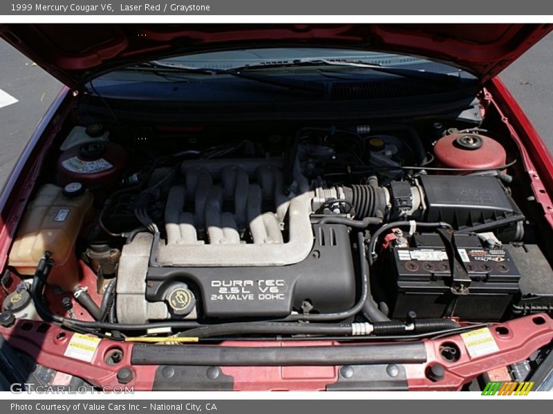 Laser Red / Graystone 1999 Mercury Cougar V6