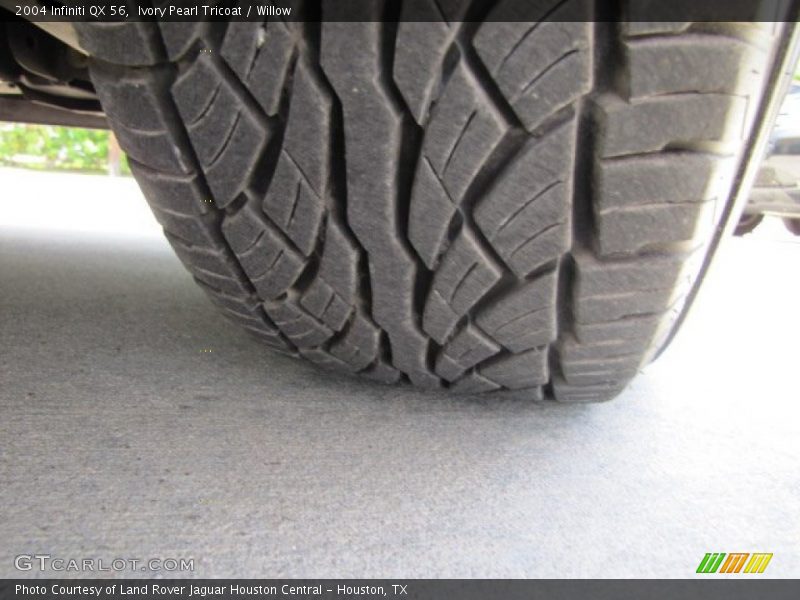 Ivory Pearl Tricoat / Willow 2004 Infiniti QX 56