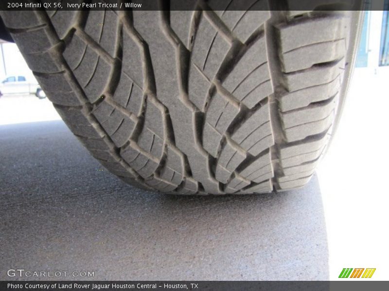 Ivory Pearl Tricoat / Willow 2004 Infiniti QX 56