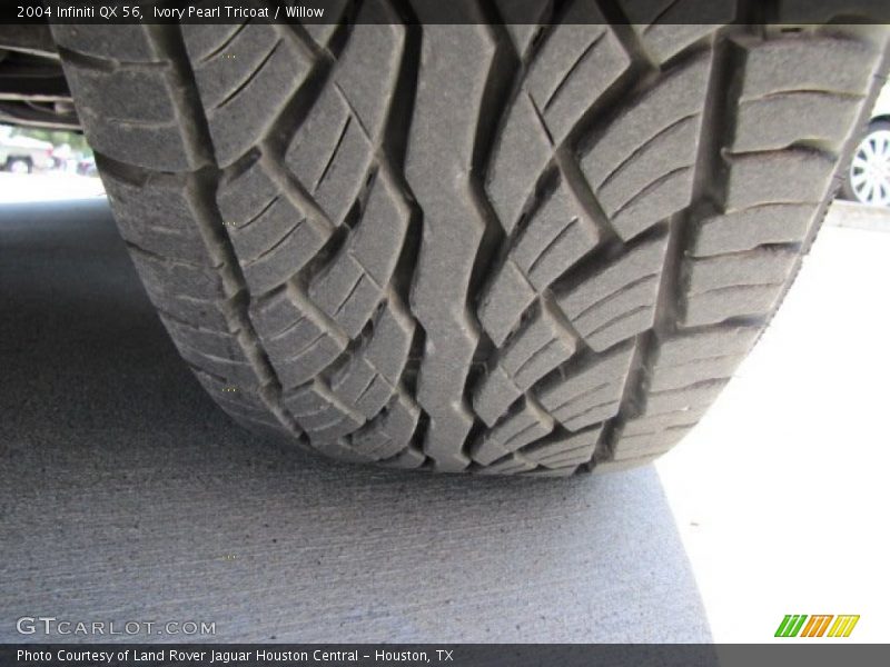 Ivory Pearl Tricoat / Willow 2004 Infiniti QX 56