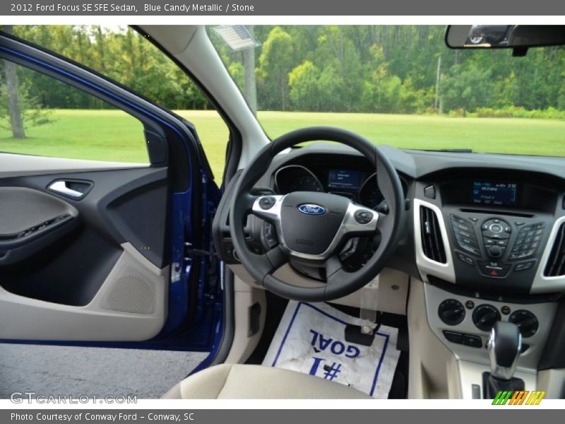 Blue Candy Metallic / Stone 2012 Ford Focus SE SFE Sedan