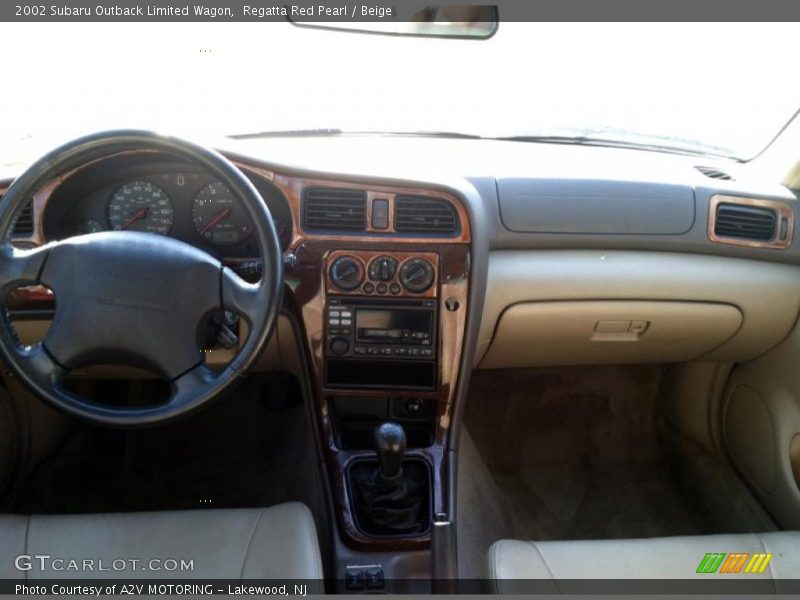 Regatta Red Pearl / Beige 2002 Subaru Outback Limited Wagon