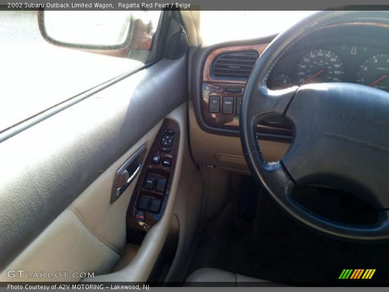 Regatta Red Pearl / Beige 2002 Subaru Outback Limited Wagon