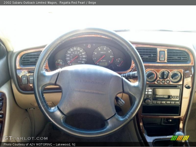 Regatta Red Pearl / Beige 2002 Subaru Outback Limited Wagon