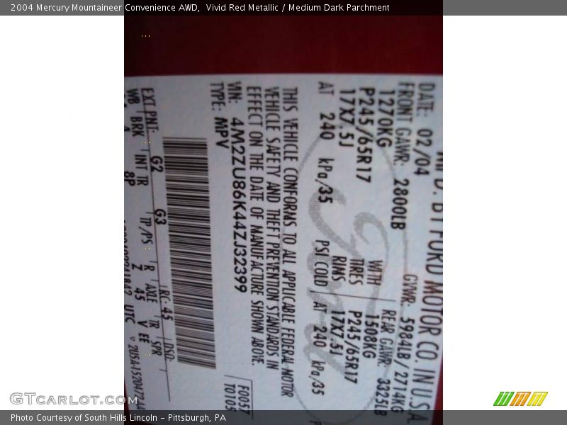 Vivid Red Metallic / Medium Dark Parchment 2004 Mercury Mountaineer Convenience AWD