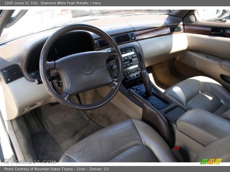 Diamond White Pearl Metallic / Ivory 1995 Lexus SC 300