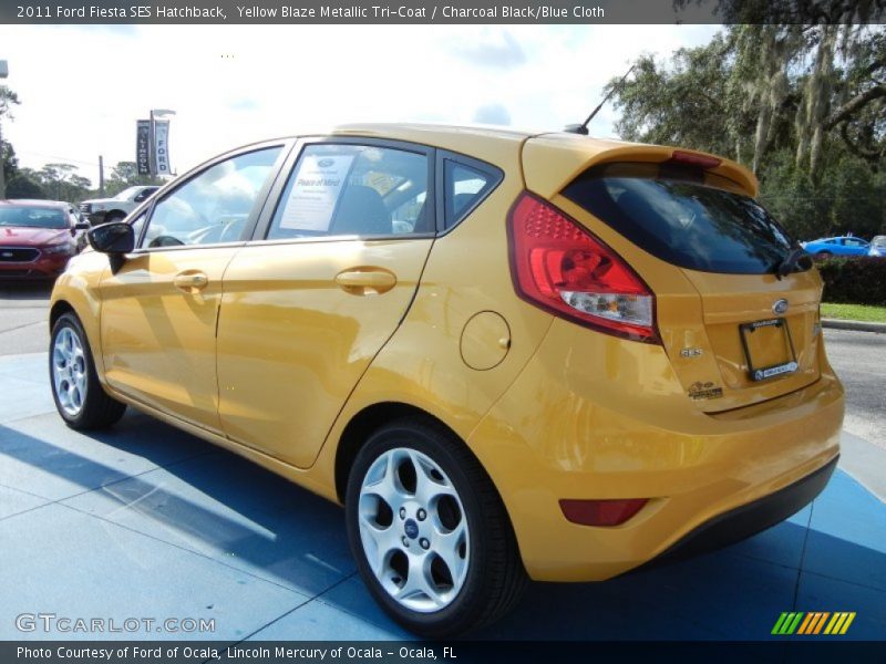 Yellow Blaze Metallic Tri-Coat / Charcoal Black/Blue Cloth 2011 Ford Fiesta SES Hatchback