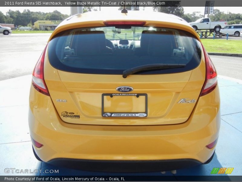 Yellow Blaze Metallic Tri-Coat / Charcoal Black/Blue Cloth 2011 Ford Fiesta SES Hatchback