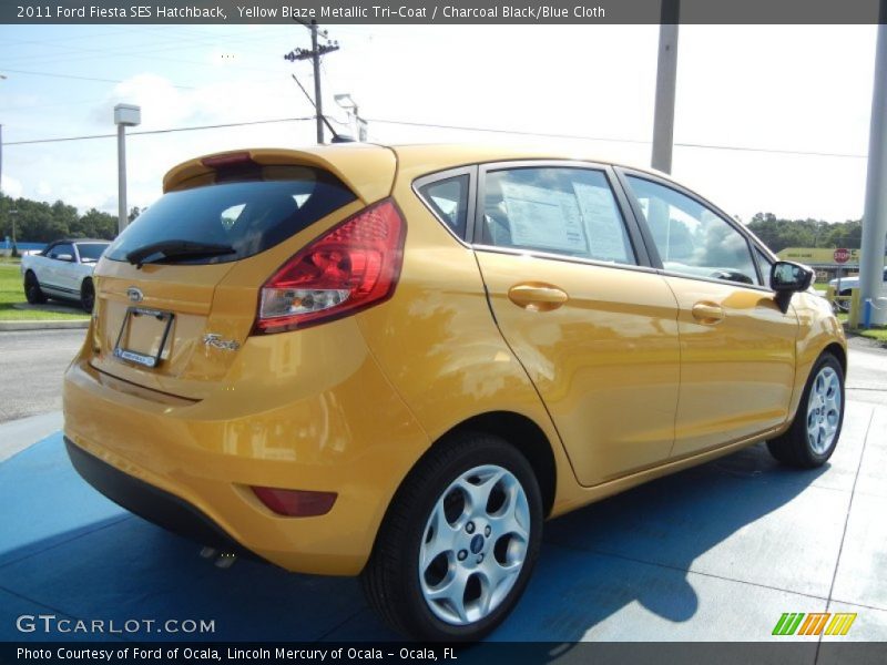 Yellow Blaze Metallic Tri-Coat / Charcoal Black/Blue Cloth 2011 Ford Fiesta SES Hatchback