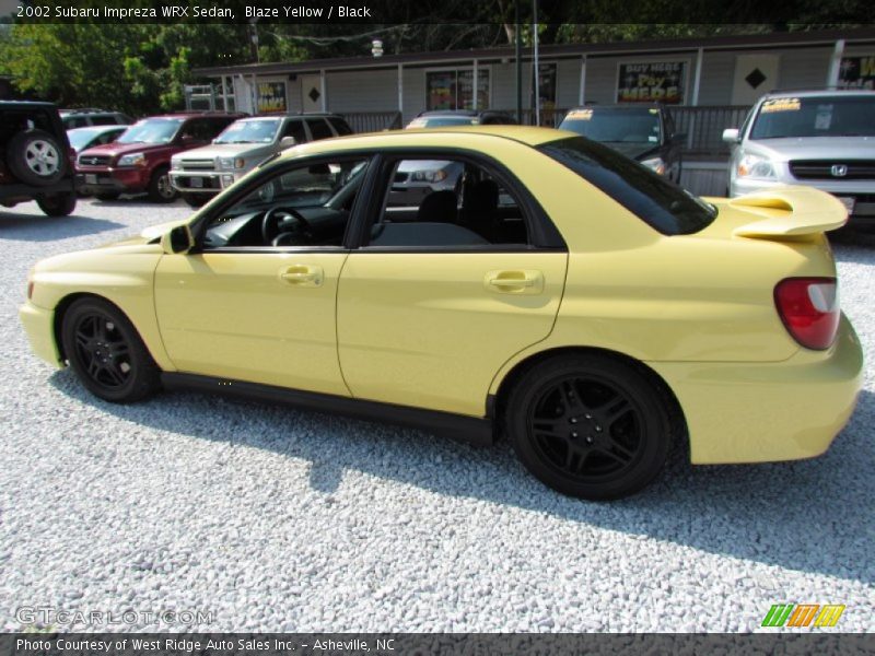 Blaze Yellow / Black 2002 Subaru Impreza WRX Sedan