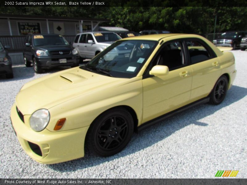Blaze Yellow / Black 2002 Subaru Impreza WRX Sedan