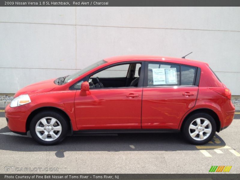 Red Alert / Charcoal 2009 Nissan Versa 1.8 SL Hatchback