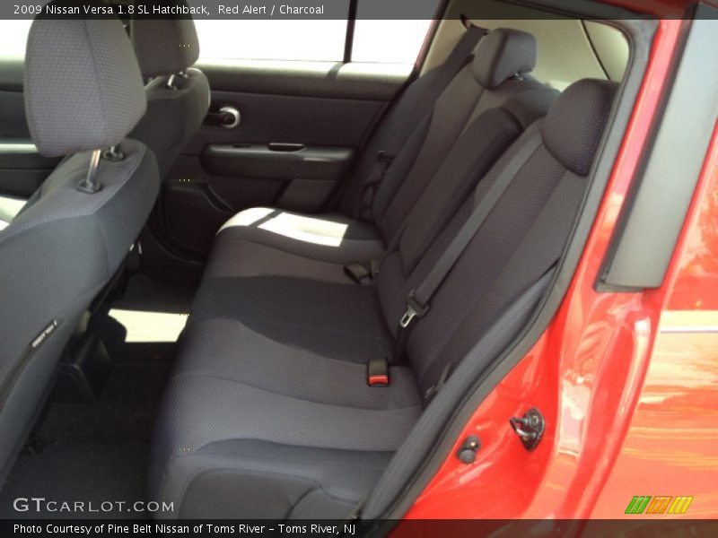 Red Alert / Charcoal 2009 Nissan Versa 1.8 SL Hatchback