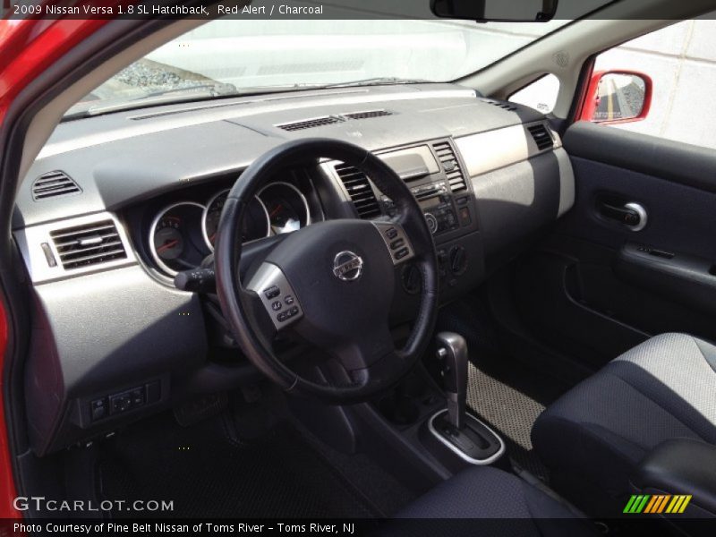 Red Alert / Charcoal 2009 Nissan Versa 1.8 SL Hatchback