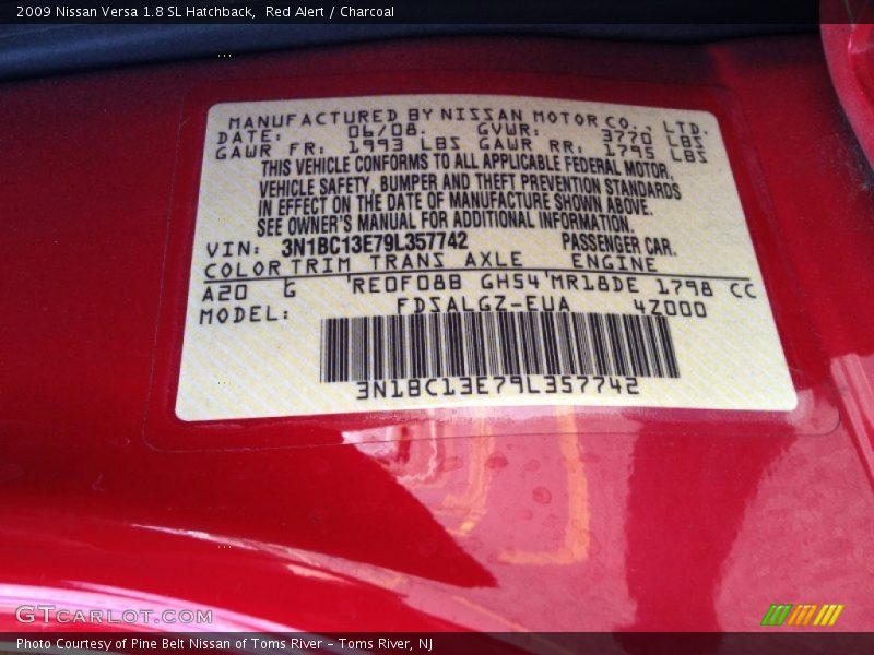 Red Alert / Charcoal 2009 Nissan Versa 1.8 SL Hatchback