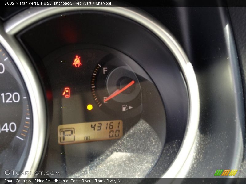 Red Alert / Charcoal 2009 Nissan Versa 1.8 SL Hatchback