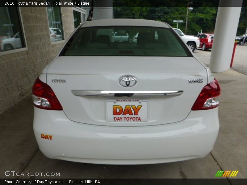 Polar White / Bisque 2010 Toyota Yaris Sedan