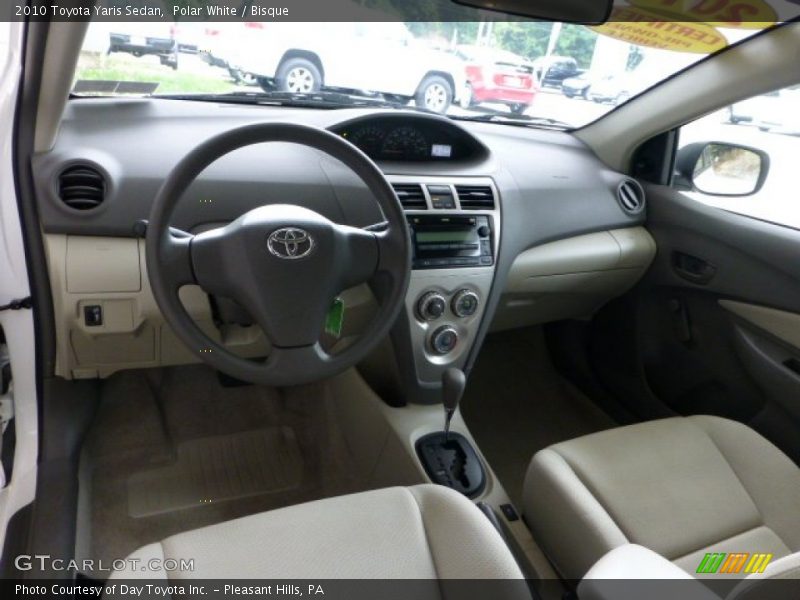 Polar White / Bisque 2010 Toyota Yaris Sedan