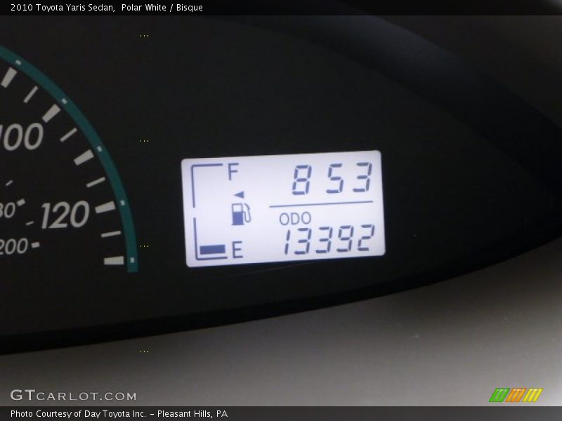 Polar White / Bisque 2010 Toyota Yaris Sedan