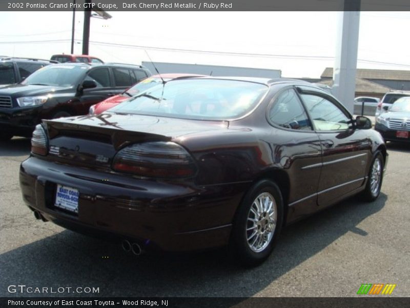 Dark Cherry Red Metallic / Ruby Red 2002 Pontiac Grand Prix GTP Coupe