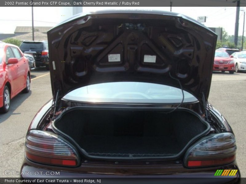 Dark Cherry Red Metallic / Ruby Red 2002 Pontiac Grand Prix GTP Coupe