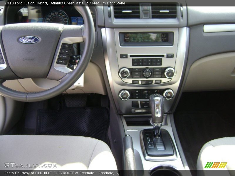Atlantis Green Metallic / Medium Light Stone 2010 Ford Fusion Hybrid