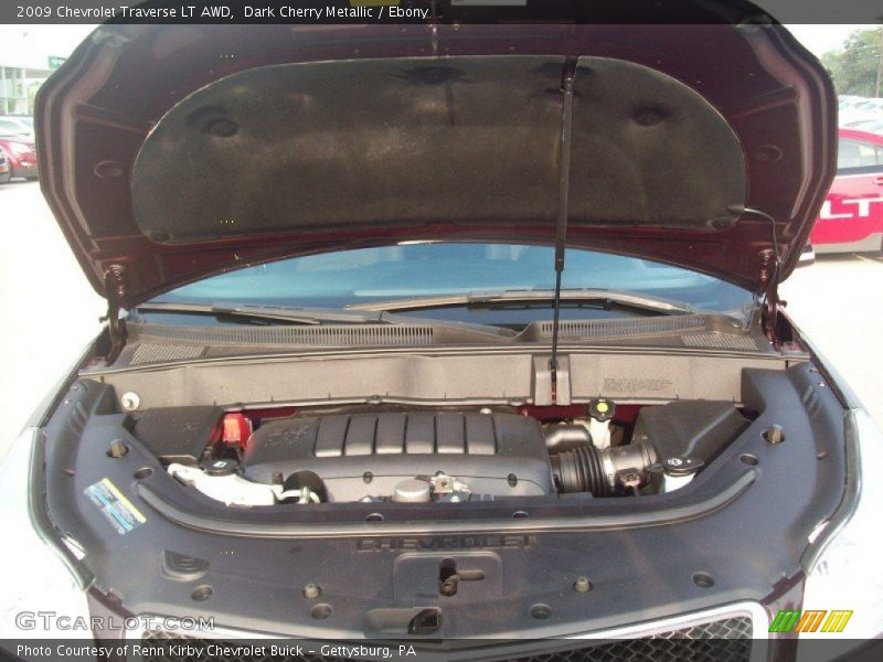 Dark Cherry Metallic / Ebony 2009 Chevrolet Traverse LT AWD