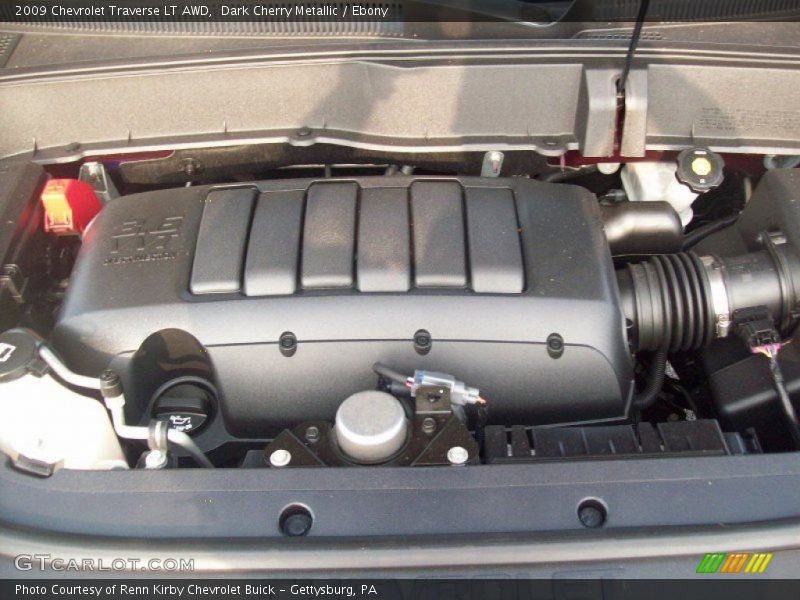 Dark Cherry Metallic / Ebony 2009 Chevrolet Traverse LT AWD