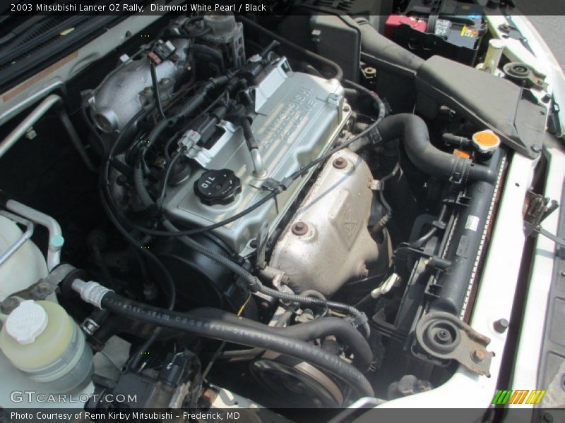 Diamond White Pearl / Black 2003 Mitsubishi Lancer OZ Rally