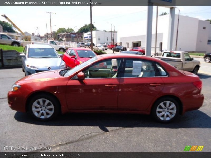 Paprika Red Pearl / Ivory 2009 Subaru Impreza 2.5i Sedan