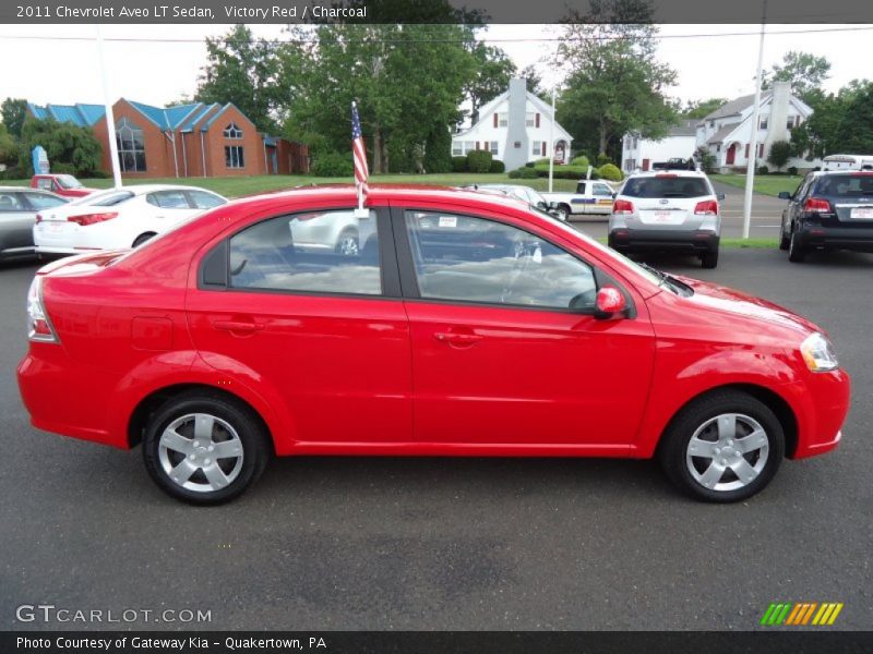 Victory Red / Charcoal 2011 Chevrolet Aveo LT Sedan