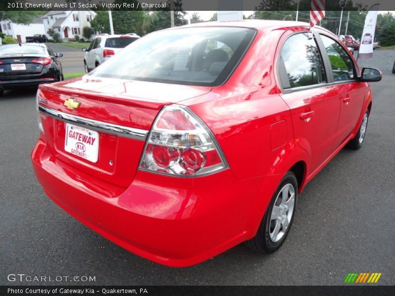 Victory Red / Charcoal 2011 Chevrolet Aveo LT Sedan