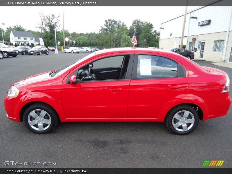 Victory Red / Charcoal 2011 Chevrolet Aveo LT Sedan