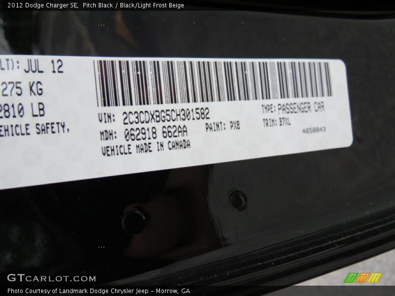 Pitch Black / Black/Light Frost Beige 2012 Dodge Charger SE