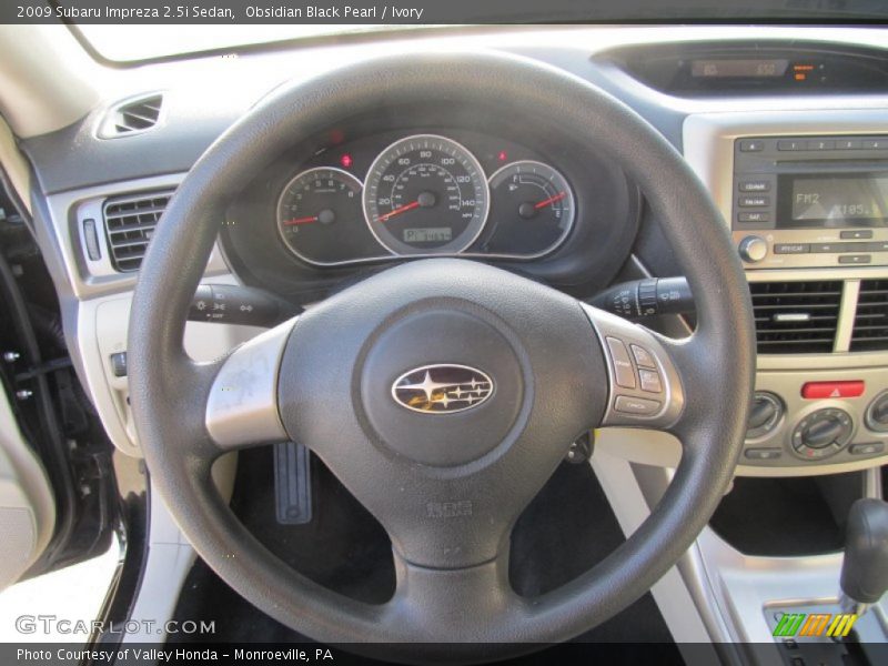 Obsidian Black Pearl / Ivory 2009 Subaru Impreza 2.5i Sedan