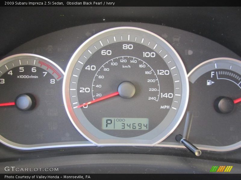 Obsidian Black Pearl / Ivory 2009 Subaru Impreza 2.5i Sedan