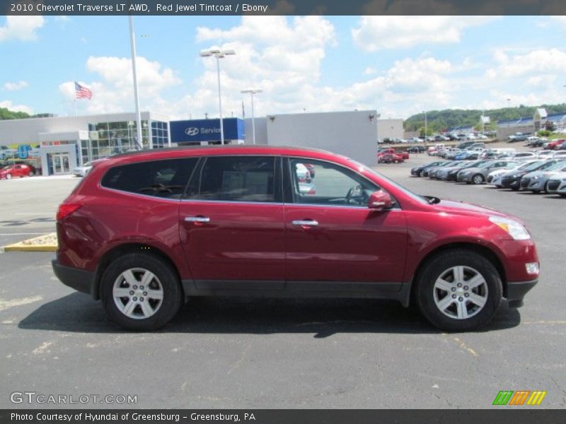 Red Jewel Tintcoat / Ebony 2010 Chevrolet Traverse LT AWD