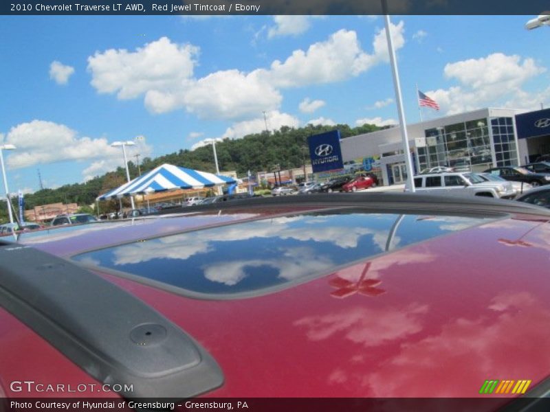 Red Jewel Tintcoat / Ebony 2010 Chevrolet Traverse LT AWD